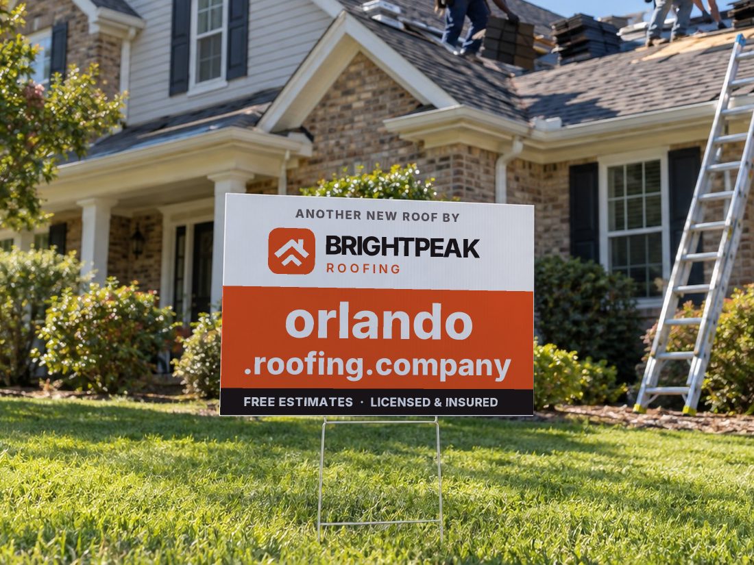 orlando.roofing.company on a yard sign in front of a house getting a new roof